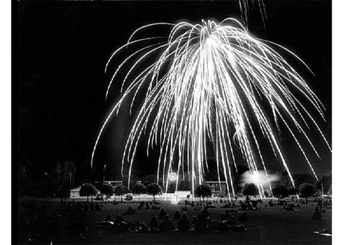 fireworks A giant firework explodes above the people gathered for the Fourth of July