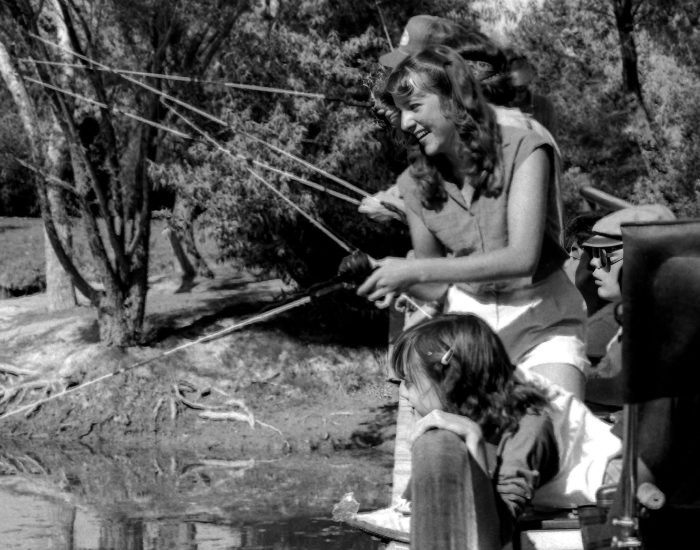 MDCamp fishing MD Campers and councelors fishing off a small peer